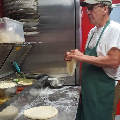 Lou stretching dough